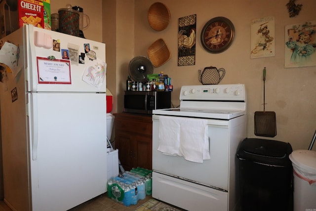 kitchen featuring white appliances