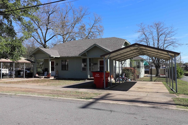 view of front facade with a carport