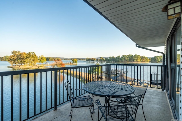 balcony featuring a water view