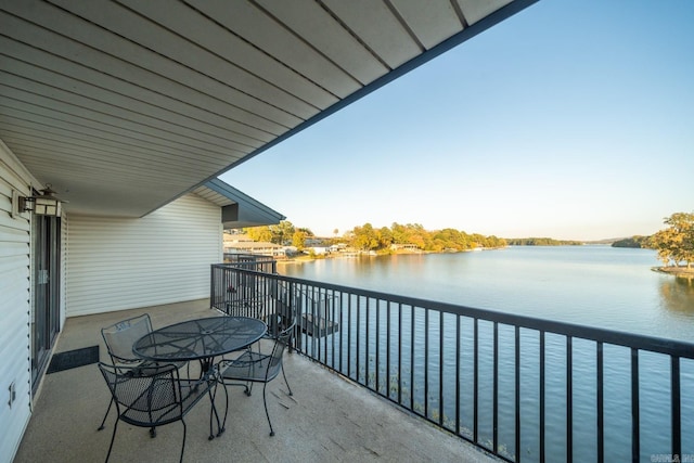 balcony featuring a water view