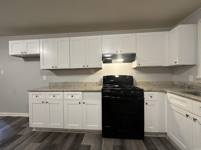 1817 W 16th St, North Little Rock, AR 72114 - kitchen with under cabinet range hood, black gas range oven, dark wood-style floors, and white cabinets