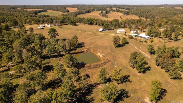 aerial view with a water view and a rural view