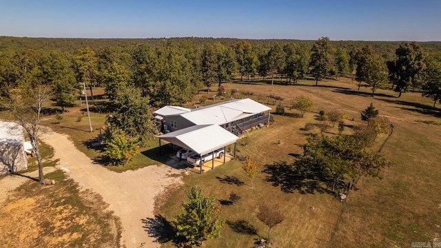 birds eye view of property with a rural view