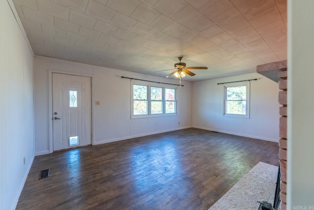 entryway featuring dark wood-type flooring and ceiling fan