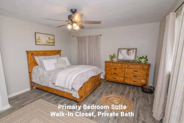 bedroom with dark hardwood / wood-style floors and ceiling fan