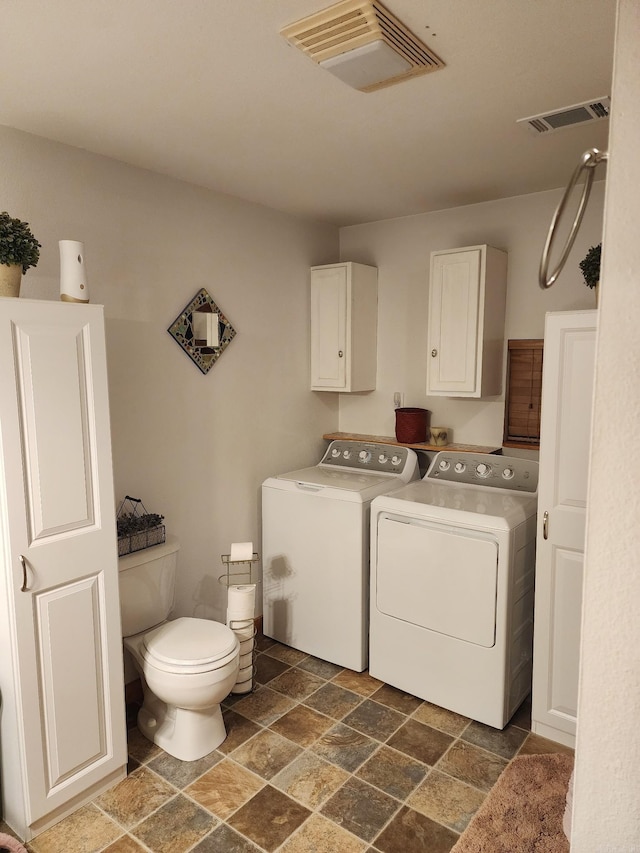 washroom featuring independent washer and dryer