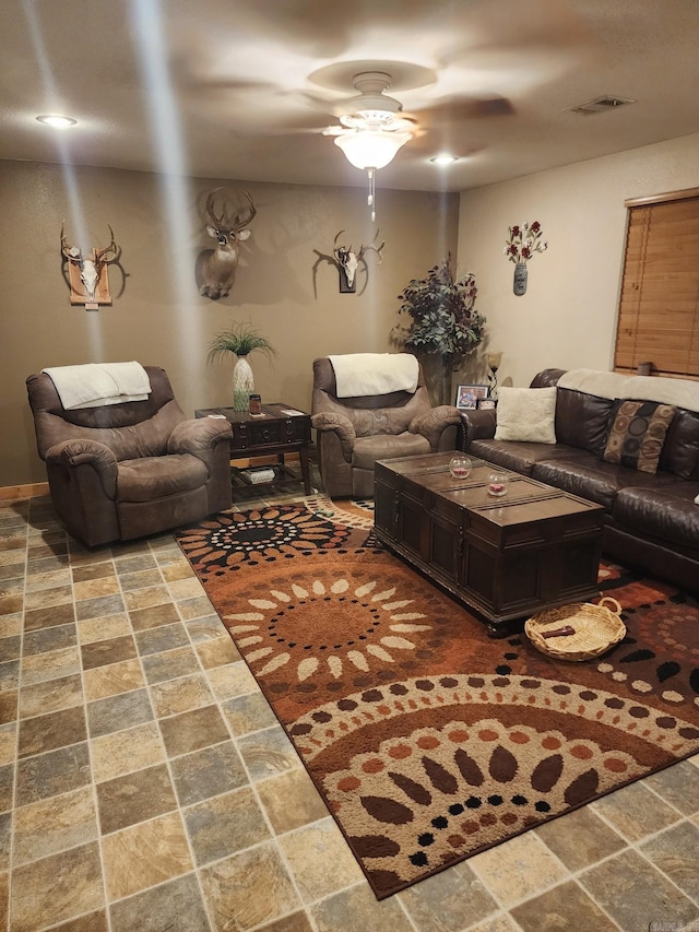 living room with ceiling fan