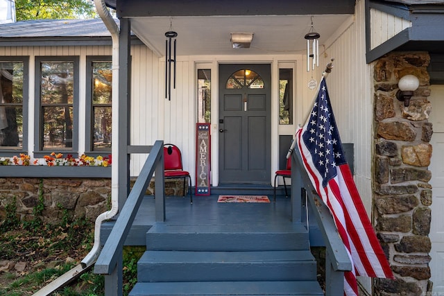 property entrance with covered porch