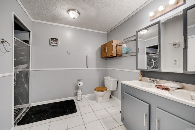 bathroom with a textured ceiling, walk in shower, toilet, vanity, and tile patterned floors