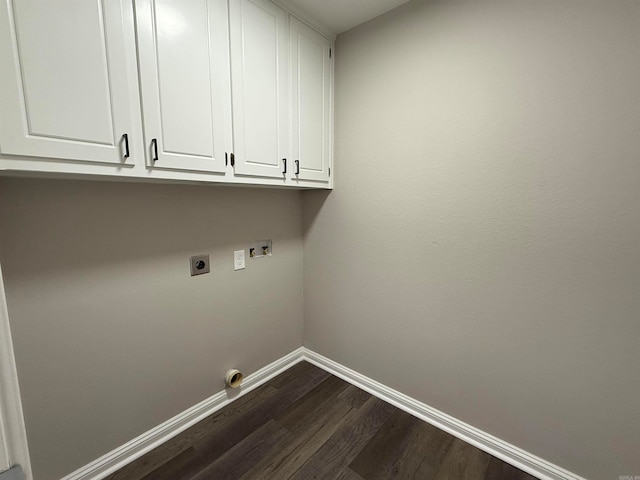 clothes washing area featuring hookup for an electric dryer, hookup for a washing machine, cabinets, and dark hardwood / wood-style flooring