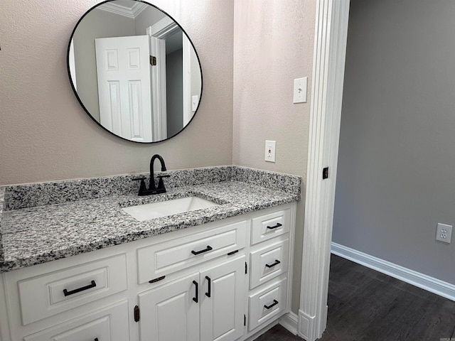 bathroom featuring vanity and wood-type flooring