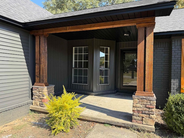 entrance to property with covered porch