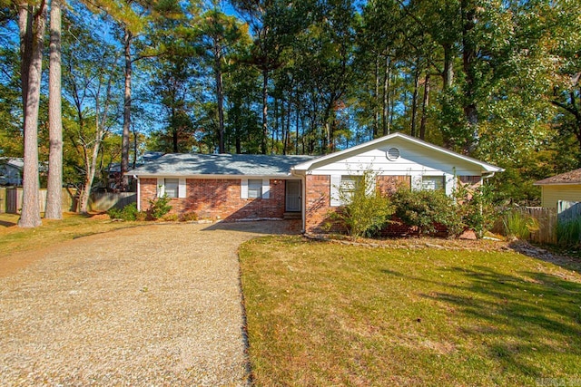 single story home with a front yard