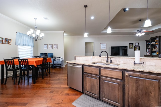 kitchen with light stone counters, stainless steel dishwasher, dark hardwood / wood-style floors, crown molding, and sink