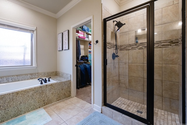 bathroom featuring crown molding, independent shower and bath, and tile patterned flooring