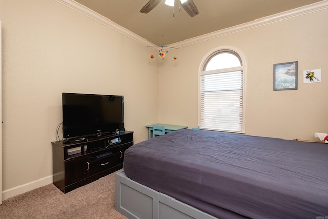 bedroom with ornamental molding, light colored carpet, and ceiling fan