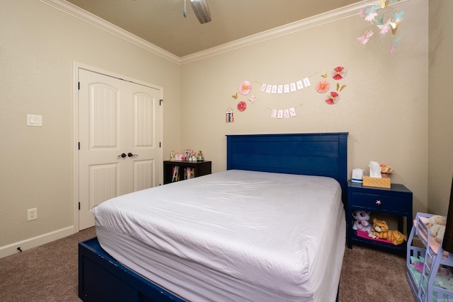 bedroom featuring a closet, crown molding, dark carpet, and ceiling fan