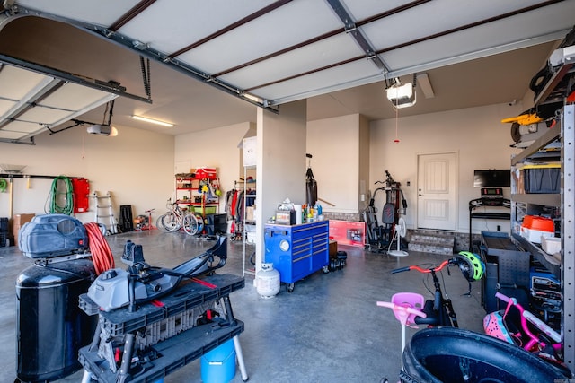 garage featuring a garage door opener