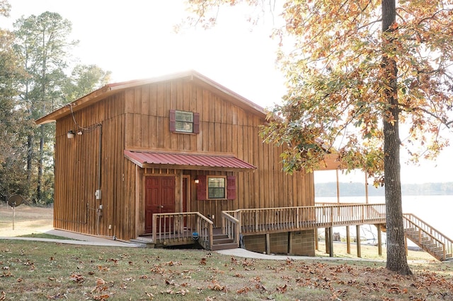 view of outbuilding featuring a water view