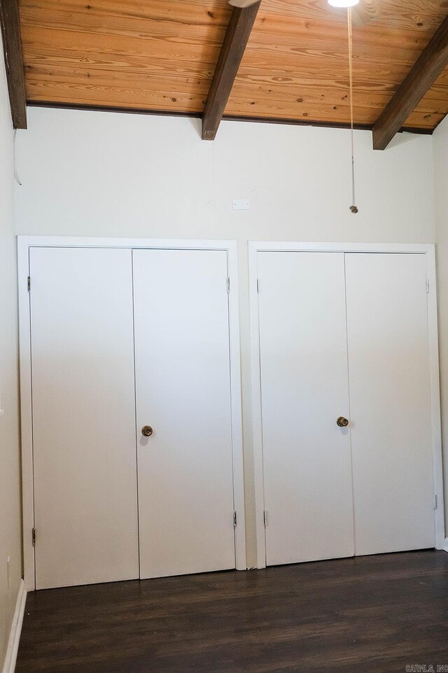 room details featuring beamed ceiling, wood ceiling, and wood-type flooring