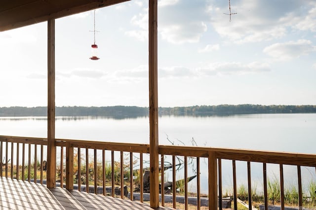 deck featuring a water view