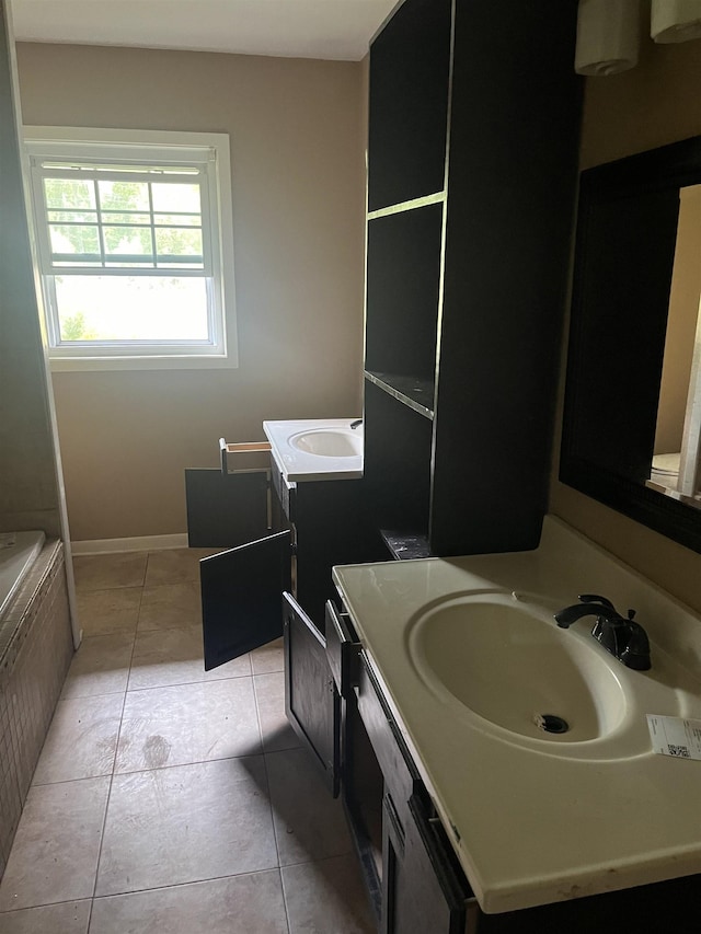bathroom with vanity and tile patterned floors