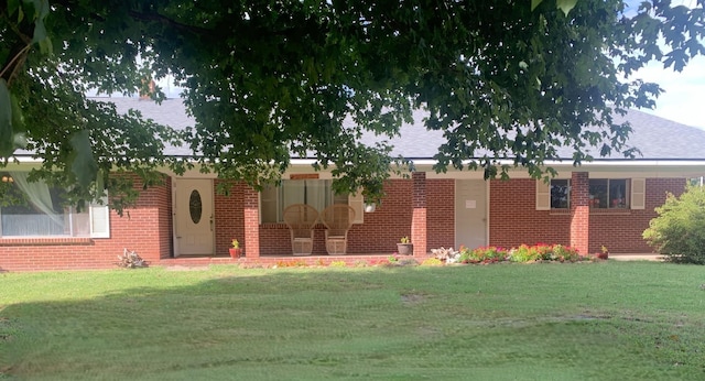 view of front of home with a front yard