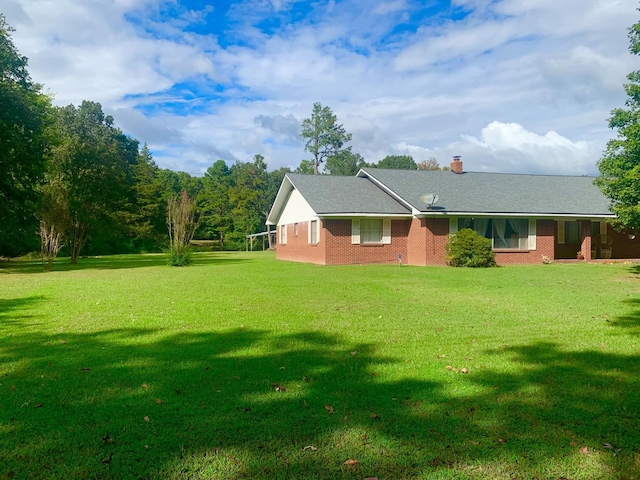 exterior space featuring a front lawn