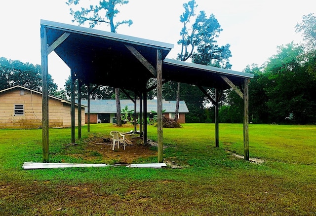 view of community featuring a gazebo and a lawn