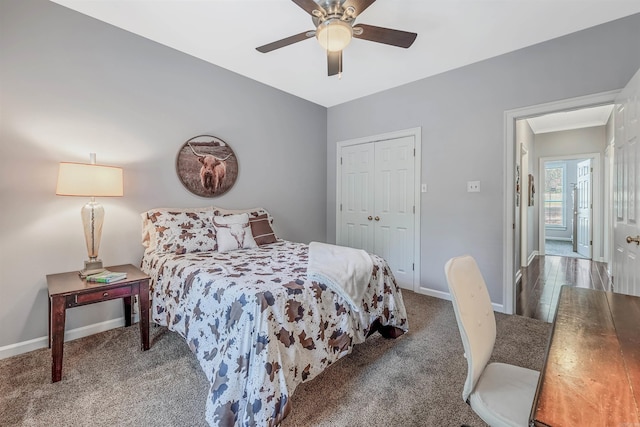 carpeted bedroom with a closet and ceiling fan