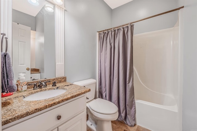 full bathroom with vanity, toilet, tile patterned flooring, and shower / tub combo with curtain