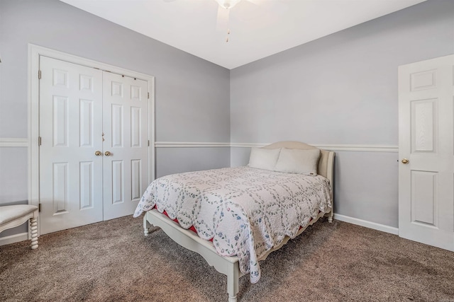 bedroom featuring a closet, dark carpet, and ceiling fan