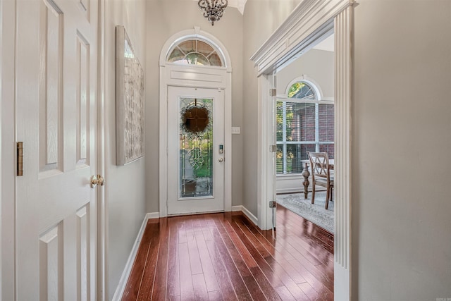 doorway featuring dark hardwood / wood-style floors