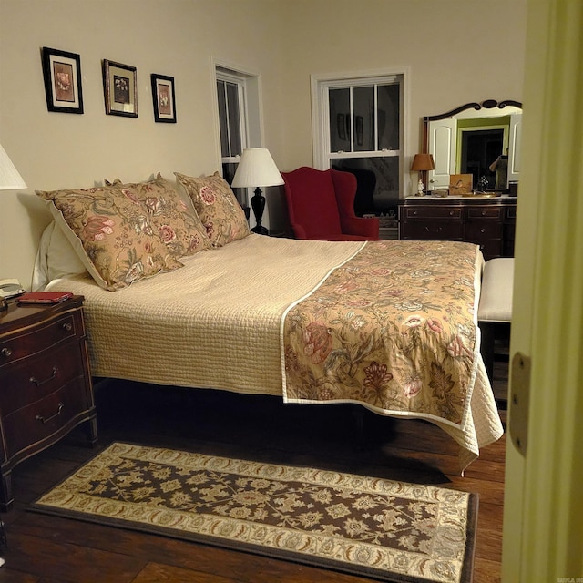 bedroom with wood-type flooring