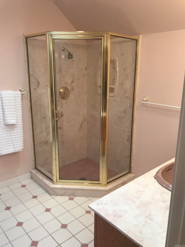 bathroom featuring vanity and walk in shower