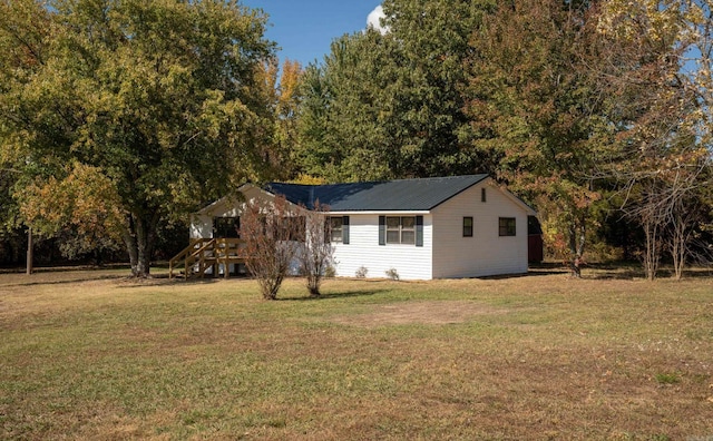 exterior space with a yard