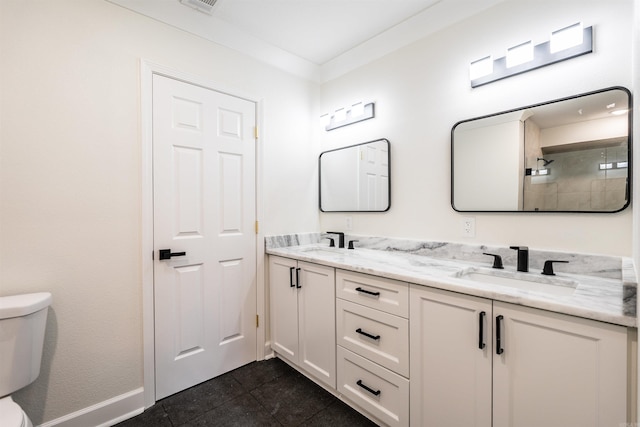 bathroom with vanity, toilet, a shower, and tile patterned flooring