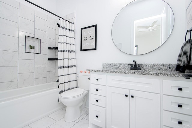 full bathroom featuring vanity, shower / bath combination with curtain, and toilet