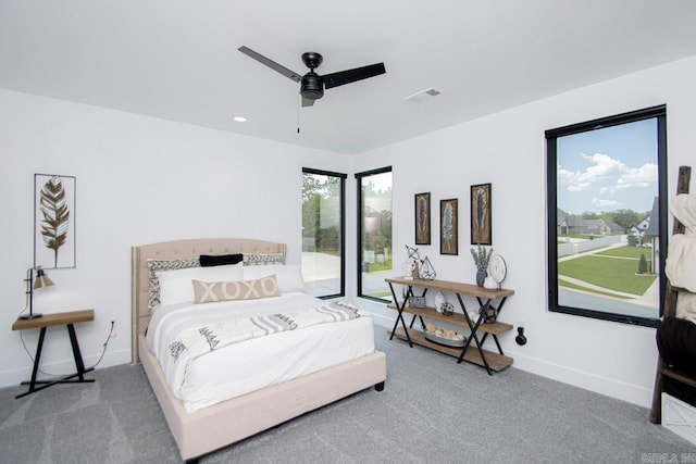 carpeted bedroom featuring ceiling fan