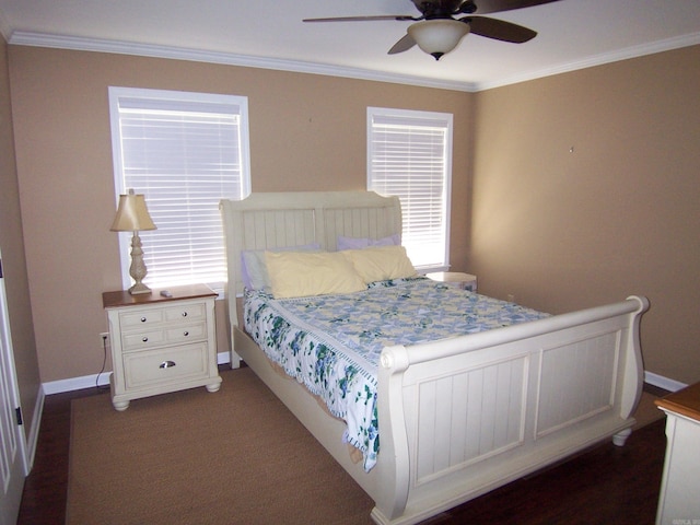 bedroom with ornamental molding and ceiling fan