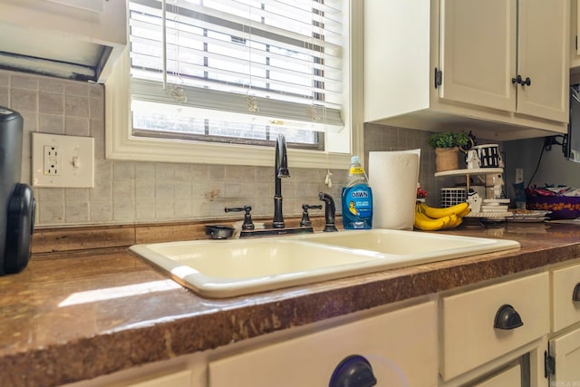 kitchen with sink and backsplash