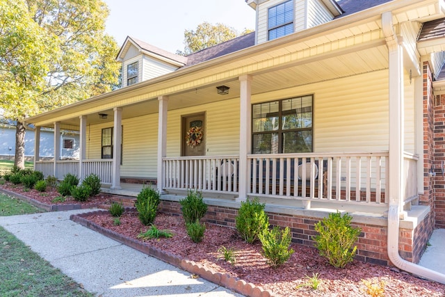 doorway to property featuring a porch