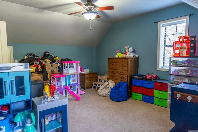 rec room featuring ceiling fan, carpet, and vaulted ceiling