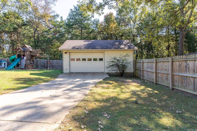 garage with a lawn