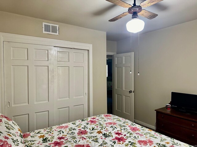 bedroom with a closet and ceiling fan