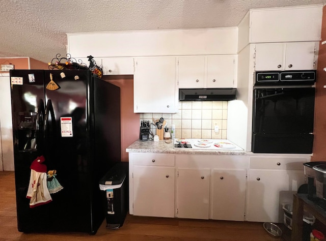 kitchen featuring black appliances, white cabinetry, decorative backsplash, and dark hardwood / wood-style flooring