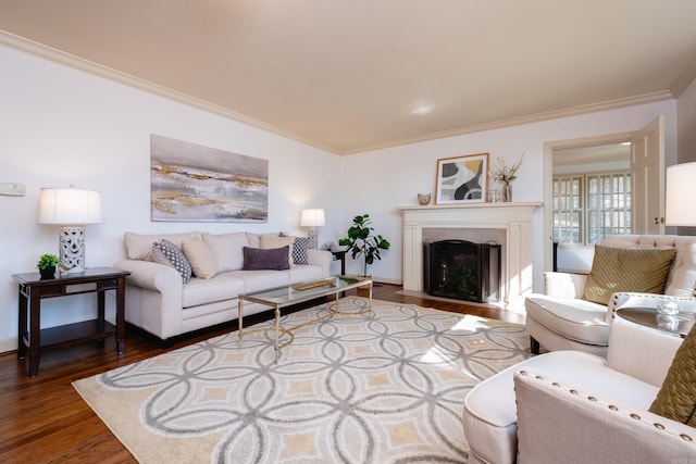 living room with crown molding and hardwood / wood-style flooring