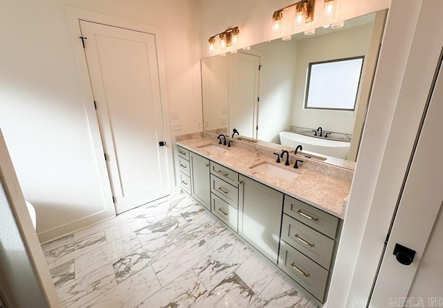 bathroom featuring a bathtub and vanity