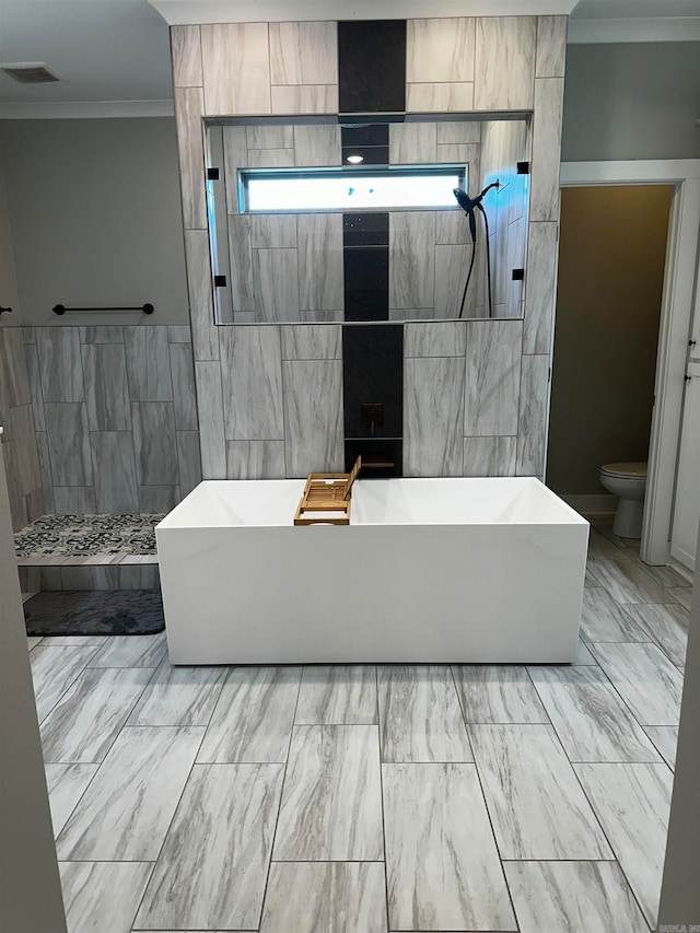 bathroom with tile walls, independent shower and bath, crown molding, and toilet