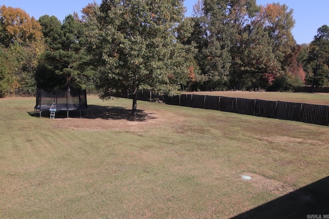 view of yard with a trampoline